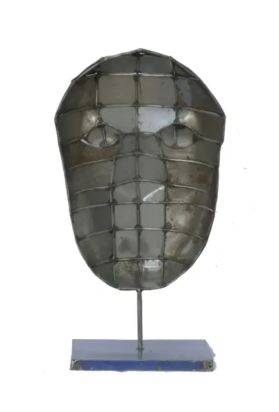 Product image 4 of the product “Small Mask on stand - Modell 4, 53cm height, sculpture from upcyceled oil barrel. ”